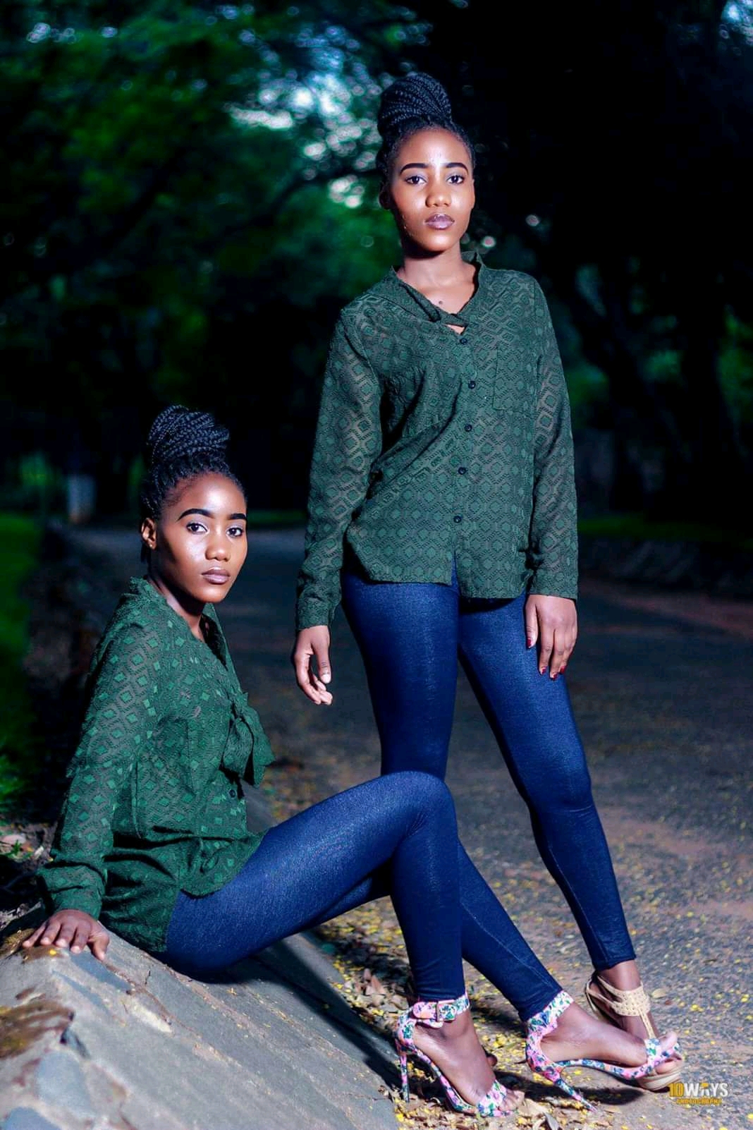 Two people posing together outdoors