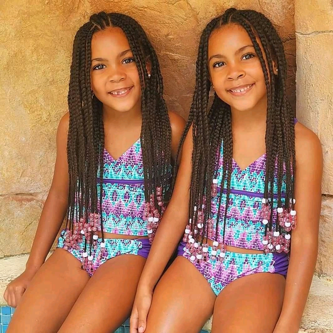 Together in matching colourful tops