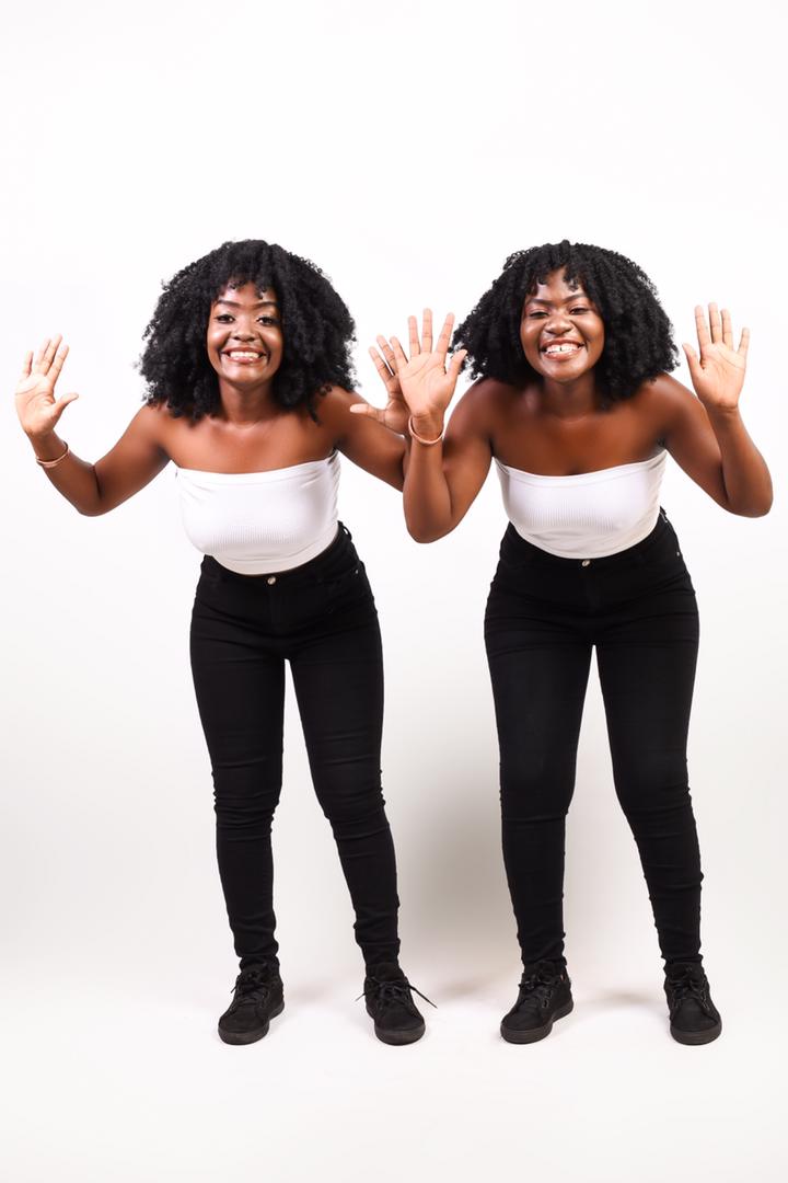 Together in white tops and black trousers